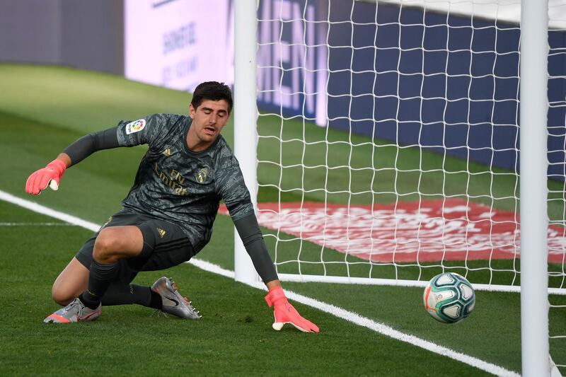 Real Madrid's Belgian goalkeeper Thibaut Courtois concedes a goal scored by Eibar's Spanish defender Pedro Bigas. AFP