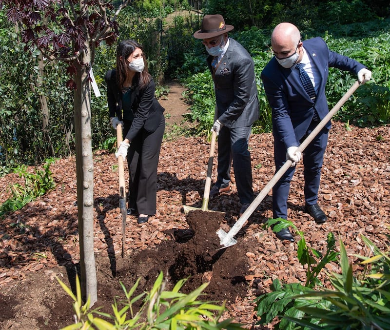 From left, Virginia Raggi, Nasser Al Belooshi and Dror Eydar, during a tree-planting ceremony in the Biopark of Rome, Italy. The theme of this year's earth day is 'Restore Our Earth', when World Earth Day will be marked with events taking place primarily online because of the Covid-19 restrictions around the world. EPA