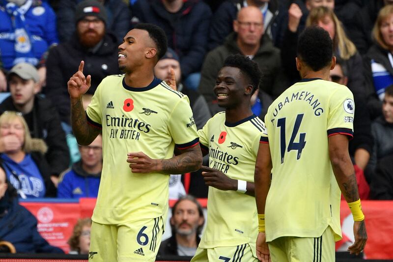 Arsenal's Brazilian defender Gabriel (L) celebrates  after scoring the opener against Leicester. AFP