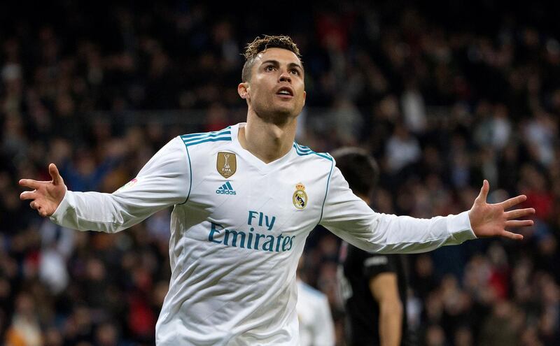 epaselect epa06613347 Real Madrid's forward Cristiano Ronaldo celebrates after scoring a goal against Girona during the Spanish Primera Division soccer match between Real Madrid and Girona at Santiago Bernabeu stadium in Madrid, Spain, 18 March 2018.  EPA/Rodrigo Jimenez