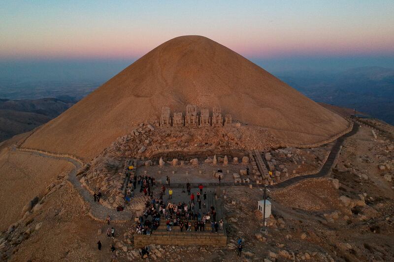 The Mount Nemrut site features a 10-metre, seated statue of King Antiochus I surrounded by ancient gods including Zeus and Apollo.