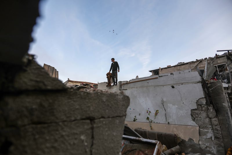 People inspect their destroyed homes following Israeli air strikes in Rafah. Strikes intensified overnight as Israel pressed on with its ground offensive in the city. Getty