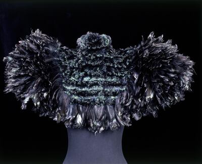 T.84-1968

Woman's cape;
black curled cock feathers;
Auguste Champol;
French;
c.1895.