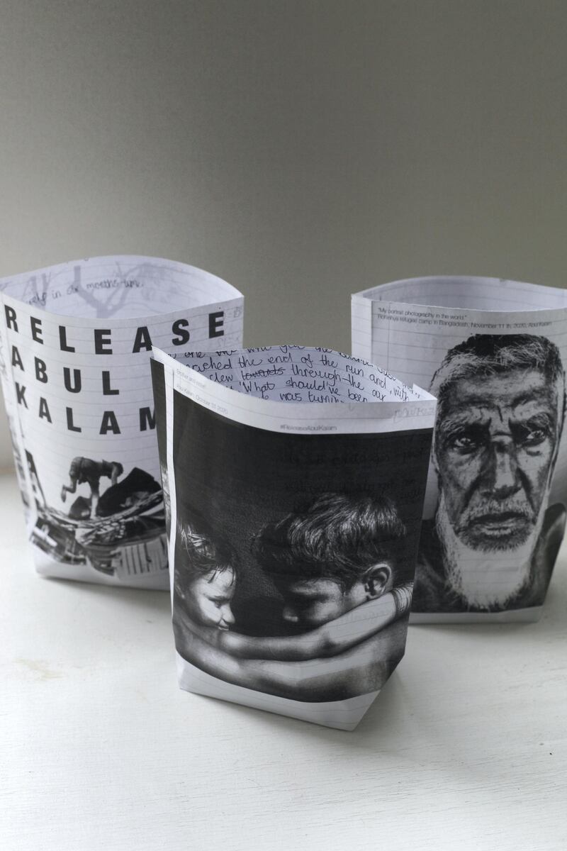 Samosa packets calling for the release of Rohingya photographer Abul Kalam. Designed and made by Sofia Karim using photographs by Abul Kalam. Part of Sofia Karim’s Turbine Bagh project, 2019-ongoing. Photograph: Sofia Karim. Courtesy Jameel Prize: Poetry to Politics at the Victoria and Albert Museum