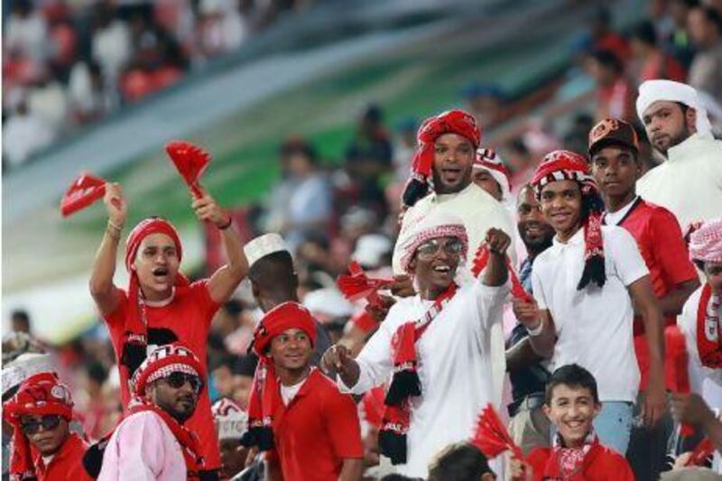 Al Ahli fans were in the Mohammed bin Zayed Stadium in Abu Dhabi well in advance before the start of the game despite the heat. Satish Kumar / The National