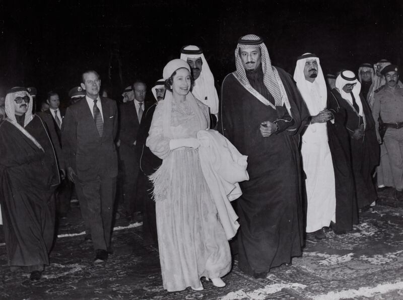 The album of 39 photos was taken during the queen and Prince Philip's six-nation tour of Gulf States. In this photo, they are being officially welcomed by King Khalid of Saudi Arabia.