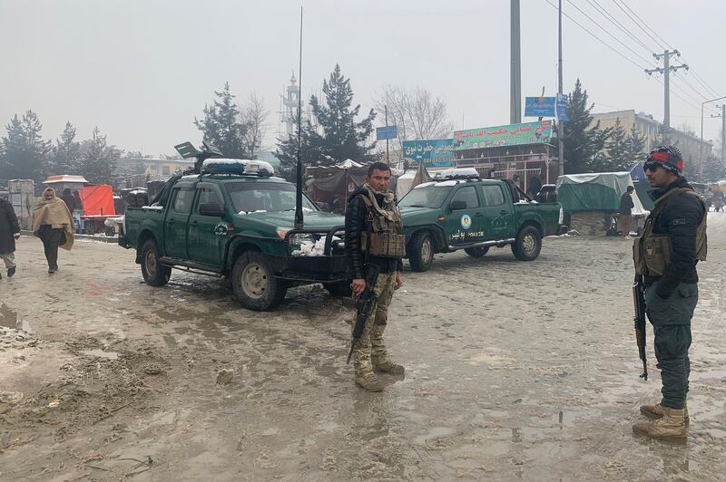 Afghan police arrive at the site of an explosion near the military academy in Kabul, Afghanistan, Tuesday, Feb. 11, 2020. An explosion occurred early Tuesday near the military academy in a southern neighborhood of the Afghan capital, a government spokesman said. (AP Photo/Rahmat Gul)