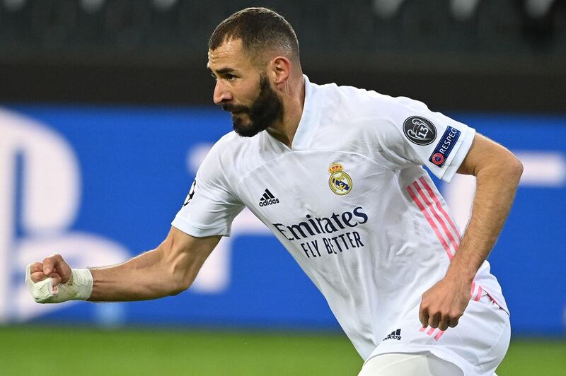 Real Madrid forward Karim Benzema pulls a goal back. AFP