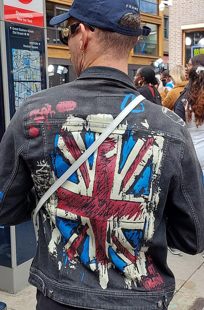 A nod to the late Queen Elizabeth II with a Union Jack on the back of a jacket. 
