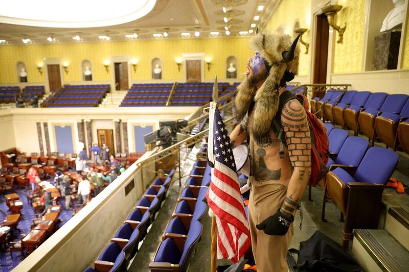 A protester yells inside the Senate Chamber. AFP