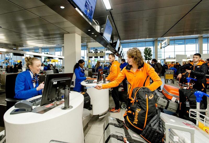 Dutch Speed Skater Ireen Wust checks in at airport Schiphol for her flight from the Netherlands to the Sochi 2014 Olympic Games.  Robin van Lonkhuijsen / EPA