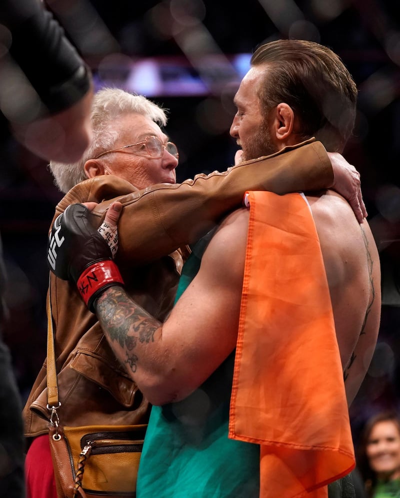 MMA Mixed Martial Arts - UFC 246 - Welterweight - Conor McGregor v Donald Cerrone - T-Mobile Arena, Las Vegas, United States - January 18, 2020 Conor McGregor with Jerry Cerrone, grandmother of Donald Cerrone after the fight REUTERS/Mike Blake