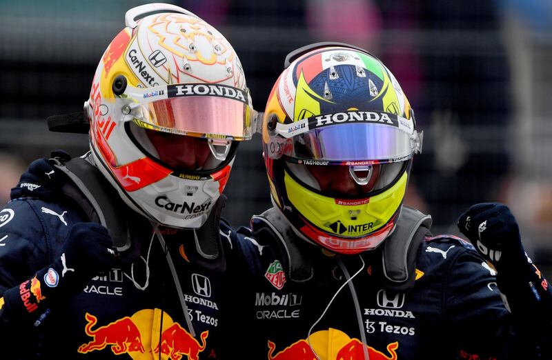 Race winner Max Verstappen with Red Bull teammate Sergio Perez who finished third. Getty