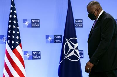 epa09134747 US Defence Secretary Lloyd Austin arrives at NATO's headquarters in Brussels, Belgium, 14 April 2021. Foreign ministers of the US, Britain, France and Germany hold talks on Afghanistan, after the United States announced the withdrawal of all its troops from the country by September 11.  EPA/KENZO TRIBOUILLARD / POOL