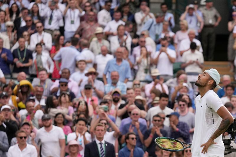 Australia's Nick Kyrgios reacts after defeating Chile's Cristian Garin in their quarter-final match at the Wimbledon Championships in London, on July 6, 2022. AP 