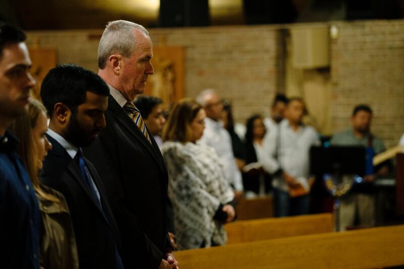 New Jersey Gov Phil Murphy attends the Mass along with representatives from the office of Congressman Max Rose and District Attorney Michael E. McMahon at St. Adalbert's R.C. Church in Staten Island borough of New York , to honor the victims who died in the bombings in various Sri Lankan churches on Easter Sunday. Joseph Ostapiuk/Staten Island Advance via AP