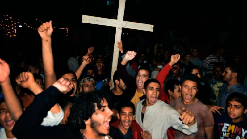 Coptic Christians chant slogans during a protest. AP Photo