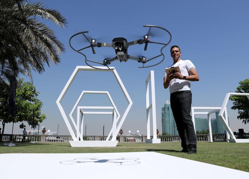 Dubai, United Arab Emirates - October 16th, 2017: Ahmad Al Hamadi flies a drone at the UASF Drone Conference. Monday, October 16th, 2017 at Palazzo Versace Hotel, Dubai. Chris Whiteoak / The National