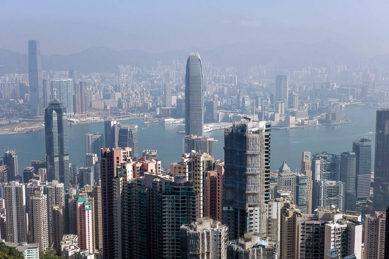 This picture taken on February 1, 2013 shows the city's skyline in Hong Kong.  According to reports on February 20, 2013 hundreds of people started buying hotel units for flats as more hotel rooms could go on sale after the city's development chief said there was a legal loophole allowing such transactions.    AFP PHOTO / Philippe Lopez


