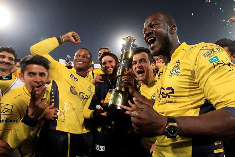 Darren Sammy, right, captained Peshawar Zalmi to the 2017 PSL title, winning the final in Lahore. Faisal Mahmood / Reuters