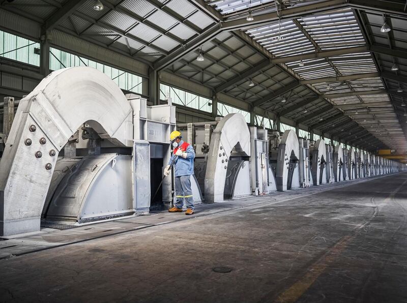 A worker on a potline at Emirates Global Aluminium's refinery. The company produced 2.6 million tons of aluminium last year, 2.3 million tons of which were 'added value' products. Image courtesy of EGA.