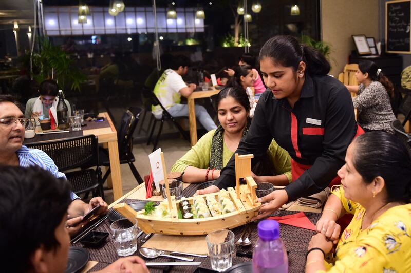 Restaurants in India will no longer be allowed to impose service charges 'automatically or by default' on food bills. AFP