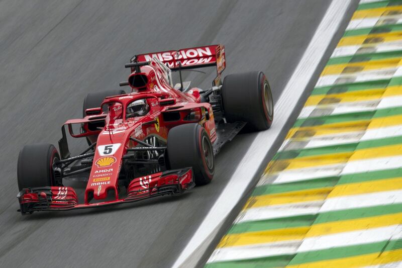 Ferrari's German driver Sebastian Vettel powers his car, during the F1 Brazil Grand Prix, at the Interlagos racetrack in Sao Paulo, Brazil on November 11, 2018. (Photo by Mauro Pimentel / AFP)