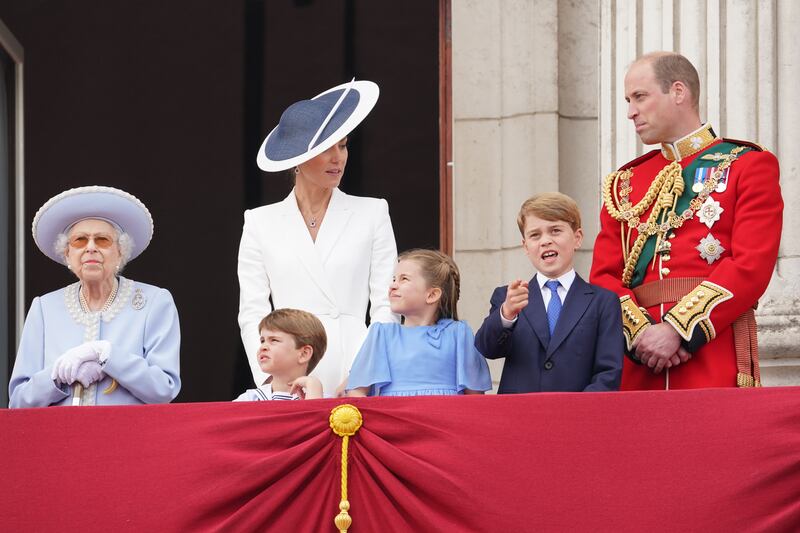 Queen Elizabeth II, Prince Louis, Catherine, Duchess of Cambridge, Princess Charlotte, Prince George and Prince William on the balcony of Buckingham Palace to watch the RAF flypast during the Trooping the Colour parade in June. 