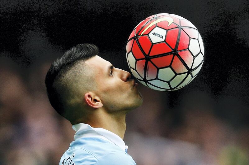 MANCHESTER, ENGLAND - OCTOBER 03:  Sergio Aguero of Manchester City kisses the ball to celebrate a goal and his hat-trick during the Barclays Premier League match between Manchester City and Newcastle United at Etihad Stadium on October 3, 2015 in Manchester, United Kingdom. (Photo by Dean Mouhtaropoulos/Getty Images)
