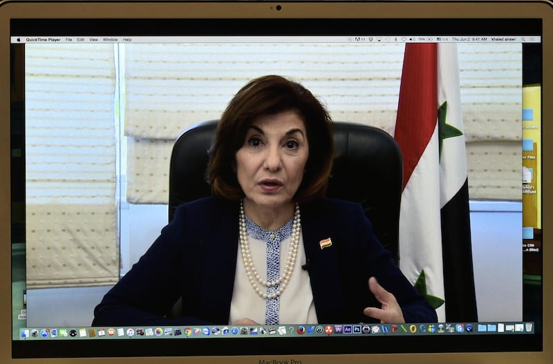 Bouthaina Shaaban, political and media adviser to the Syrian President Bashar Al-Assad, speaks via Skype during a press conference organized by The Global Alliance for Terminating ISIS/Al-Qaeda on June 2, 2016 at the National Press Club in Washington, DC. (Photo by AFP)