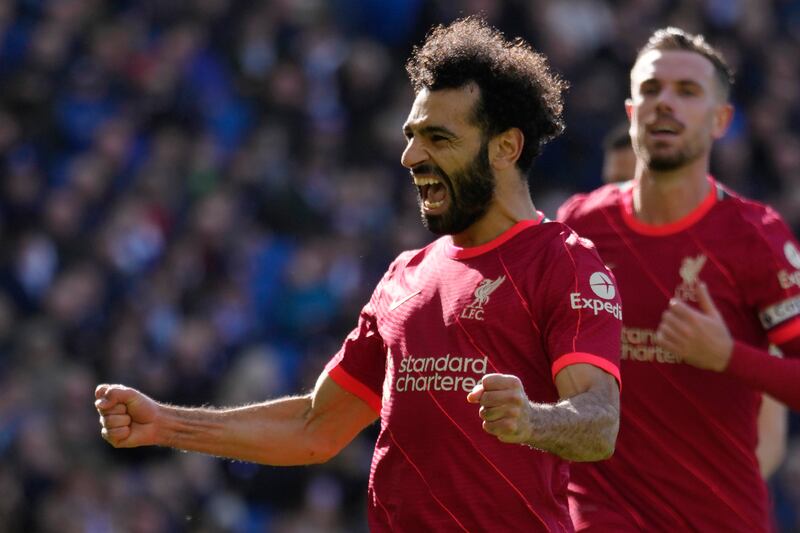 Mohamed Salah celebrates after scoring Liverpool's second goal in their 2-0 Premier League win at Brighton on Saturday, March 12, 2012. Getty