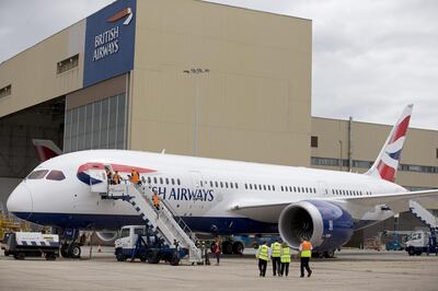 A British Airways Boeing's 787 Dreamliner parked at Heathrow Airport in London on July 4, 2013. British Airways today became the first British airline to take delivery of an Airbus A380 superjumbo plane, who's the first long-haul flight will be to Los Angeles on September 24, 2013. British Airways became the first airline in Europe to operate both the A380 and Boeing's 787 Dreamliner. AFP PHOTO/JUSTIN TALLIS / AFP PHOTO / JUSTIN TALLIS