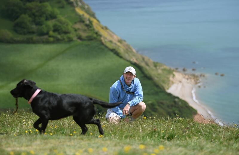 Dom Bess pictured with his family dog Tilly. Getty