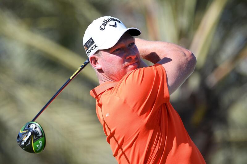 Shaun Norris of South Africa tees off on the 14th. Getty