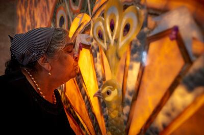 AKNALICH, ARMENIA - APRIL 14: A Yazidi worshipper kisses Melek Taus, the Peacock Angel, one of the central figures of Yazidi religion at Quba Mere Diwane Temple, the worldÕs largest Yazidi Temple, to mark Yazidi New Year on April 14, 2021 in Aknalich, Armenia. According to the 2011 census, there are 35,272 Yazidis in Armenia, making them Armenia's largest ethnic minority group. Photo by Kiran Ridley