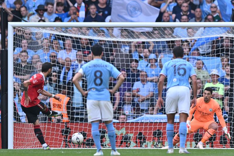 Manchester United's Bruno Fernandes scores from the penalty spot. AFP