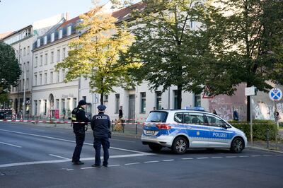 Police outside a synagogue in Berlin after an attack in which Molotov cocktails were used. AP 