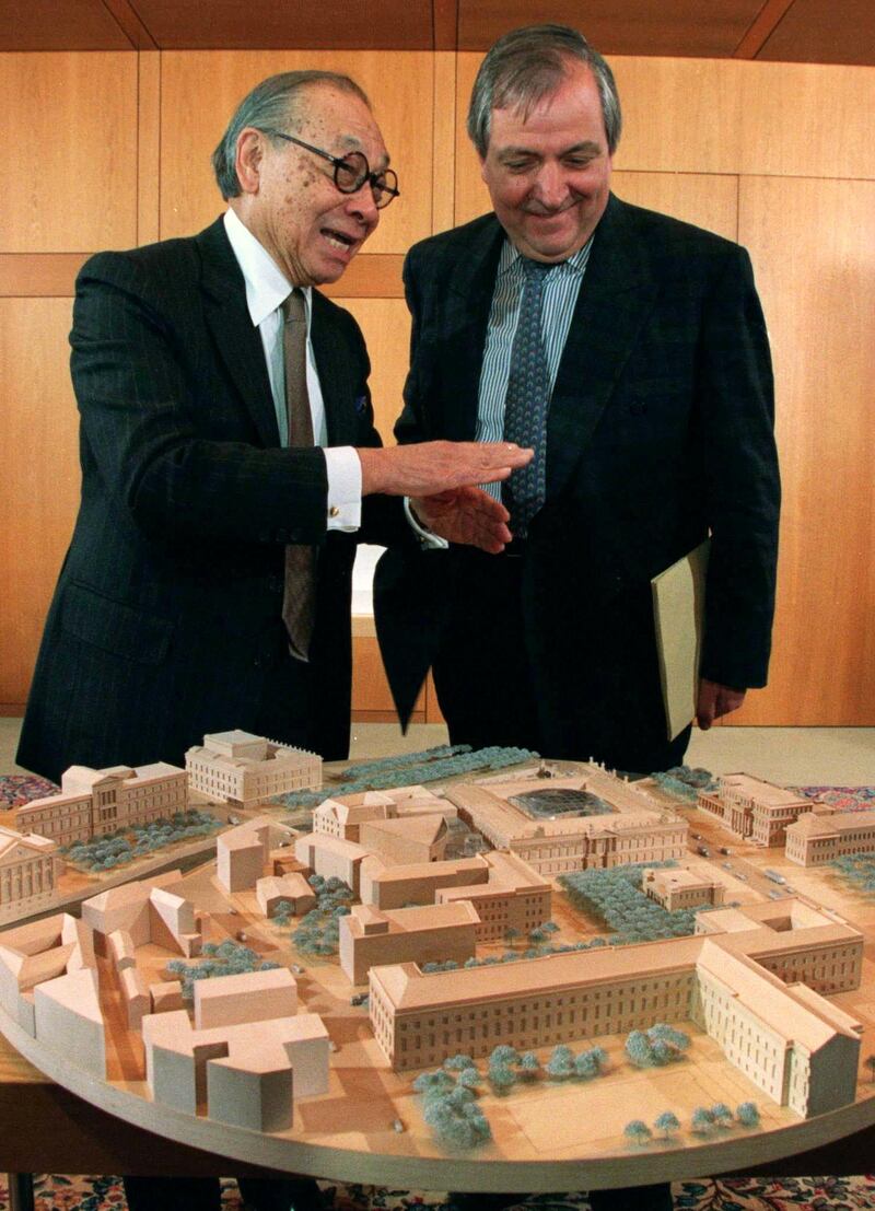 Pei explains a model of the German Historical Museum to German Housing and Construction Minister Klaus Toepfe in Bonn, Germany in 1997. Reuters