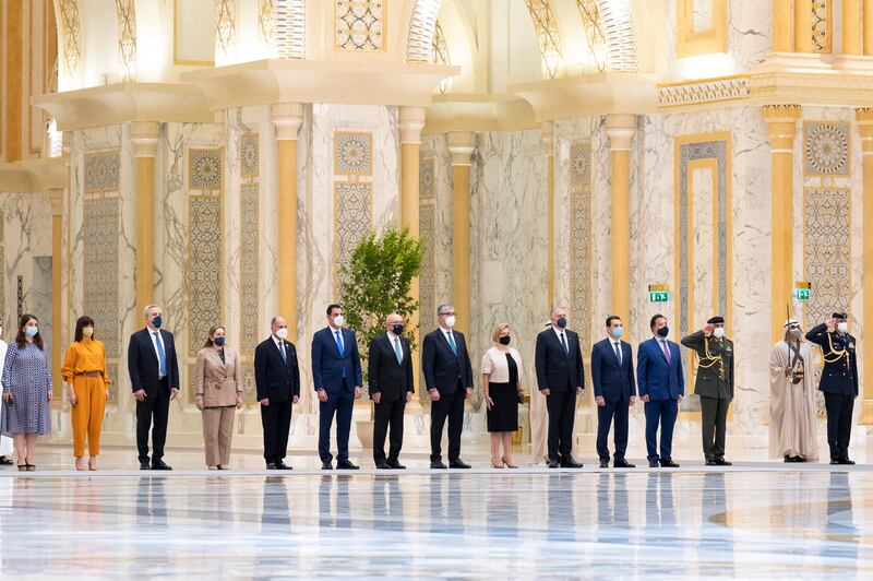 Members of the Greek delegation accompanying Mr Mitsotakis attend the official reception at Qasr Al Watan.