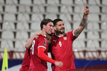 BELGRADE, SERBIA - MARCH 24: Aleksandar Mitrovic of Serbia celebrates after scoring his sides third goal with teammates Dusan Vlahovic and Milan Gajic during the FIFA World Cup 2022 Qatar qualifying match between Serbia and Republic of Ireland on March 24, 2021 in Belgrade, Serbia. Sporting stadiums around Serbia remain under strict restrictions due to the Coronavirus Pandemic as Government social distancing laws prohibit fans inside venues resulting in games being played behind closed doors. (Photo by Srdjan Stevanovic/Getty Images)