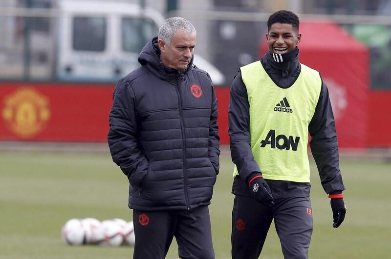 Manchester United manager Jose Mourinho, left, and Marcus Rashford attend a training session. Martin Rickett / AP Sport