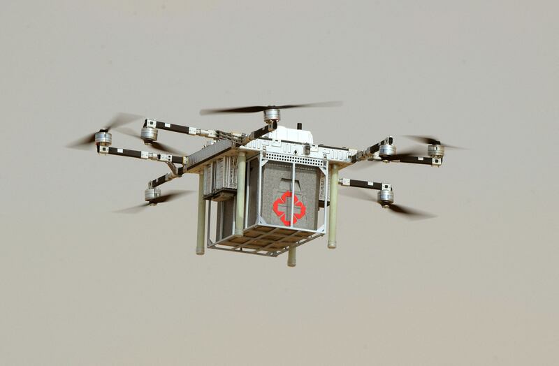 A demonstration of a delivery drone at the Umex exhibition of robotics and unmanned systems at Abu Dhabi National Exhibition Centre. AFP