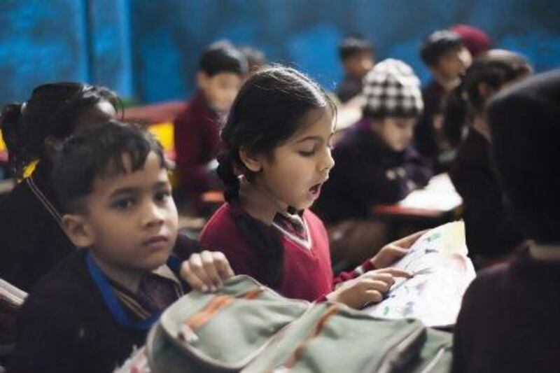 Children at a UKG (Under Kinder Garten) class at the Pioneer Public School in St Nagar, Burari, New Delhi.