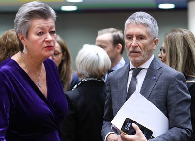 European Commissioner for Home Affairs Ylva Johansson and Spanish Interior Minister Fernando Grande-Marlaska arrive for a meeting in Brussels on Tuesday. EPA