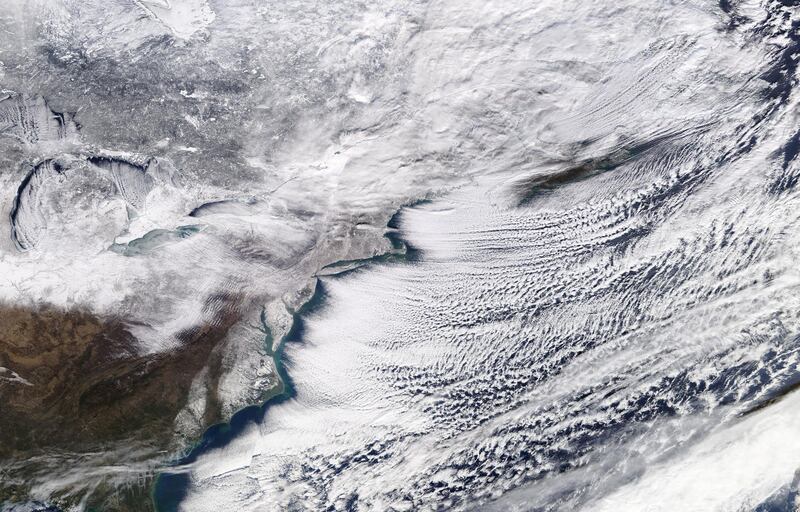 A winter storm sweeping across Ontario, eastern Canada and the northeastern United States is pictured in a NASA handout satellite photo January 6, 2018.   NASA/Handout via REUTERS ATTENTION EDITORS - THIS IMAGE WAS PROVIDED BY A THIRD PARTY.