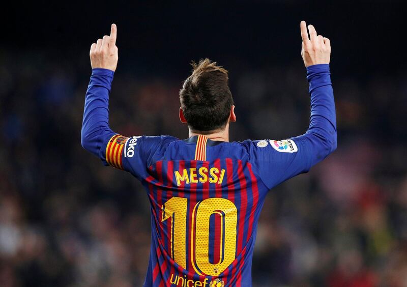 Lionel Messi celebrates scoring Barcelona's third goal. Reuters