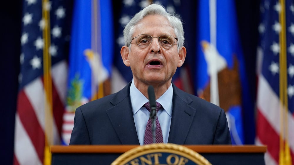 Attorney General Merrick Garland speaks at the Department of Justice in Washington, DC, January 5, 2022, in advance of the one year anniversary of the attack on the US Capitol.  (Photo by Carolyn Kaster  /  POOL  /  AFP)