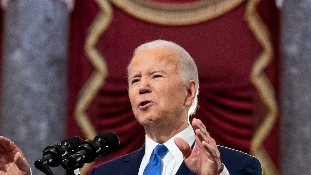 President Joe Biden speaks from Statuary Hall at the U. S.  Capitol to mark the one year anniversary of the Jan.  6 riot at the Capitol by supporters loyal to then-President Donald Trump, Thursday, Jan.  6, 2022, in Washington.  (Michael Reynolds / Pool via AP)