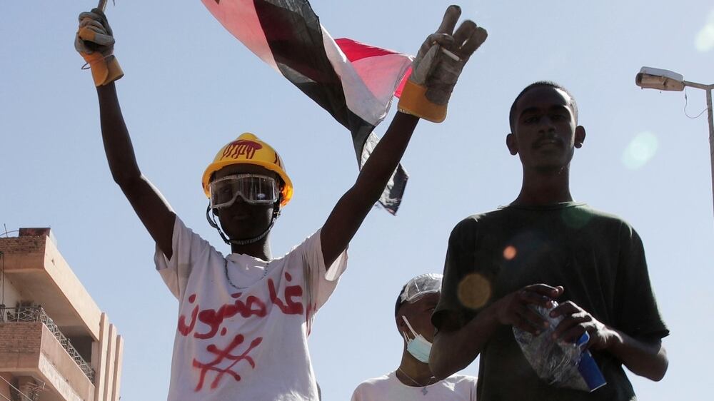 Sudanese forces fire coloured water at protesters