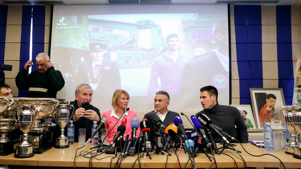 Serbian tennis player Novak Djokovic's (L-R) uncle Goran, mother Dijana, father Srdjan and brother Djordje hold a press conference in Belgrade, on January 10, 2022, after a judge in Australia overturned the cancellation of Novak Djokovic's visa over his Covid-19 vaccination status, ending five days of detention in Melbourne, where he had arrived ahead of the Australian Open.  - Djokovic was back on the court training after his release, but may still be excluded from the year's first grand slam event because of his Covid-19 vaccination status.  (Photo by Pedja MILOSAVLJEVIC  /  AFP)